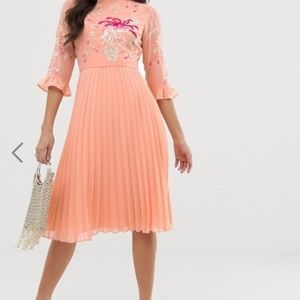 Embroidered pleated midi dress with fluted sleeve